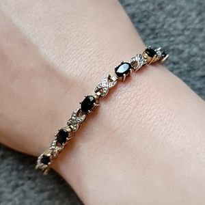 Black, Silver, and Gold Bracelet